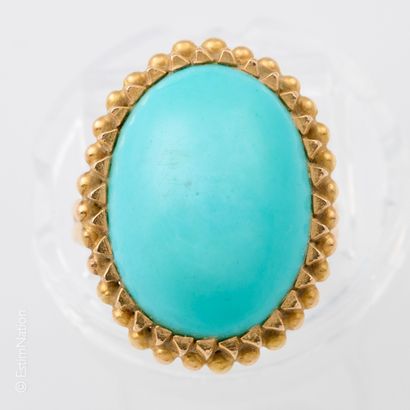 BAGUE OR JAUNE CABOCHON DE TURQUOISE
Bague...