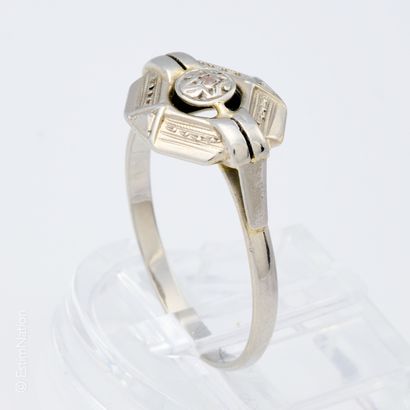 BAGUE OR GRIS
Bague en or gris 18K (750 millièmes)...