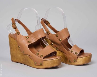 TILA MARCH
PAIR OF clog-inspired SANDALS...