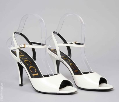 GUCCI
Pair of white glacé leather SANDALS...