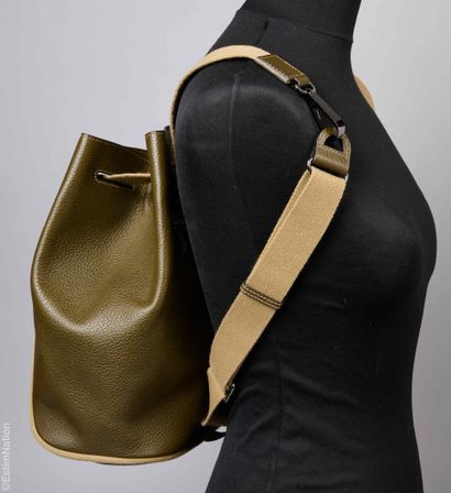 TWO VINTAGE DELVAUX
BACKPACK in grained spinach-green...