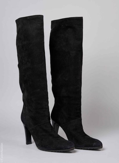 MAUD FRIZON
PAIRE DE BOTTES à talons en peau...