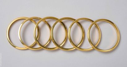 ANONYMOUS
SET OF SIX GOLDEN COPPER BRACELETS...