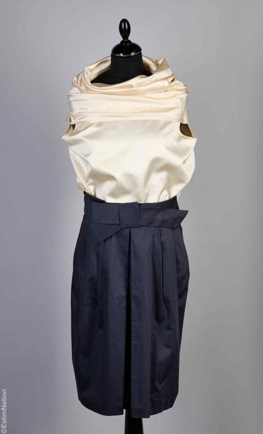 ZORAN, WEBER
Evening top in ivory silk satin...