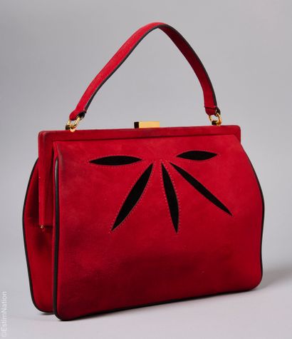 MARNI
SAC en peau rouge orné d'un motif végétal...