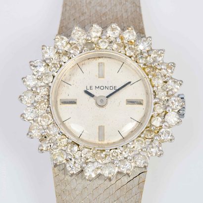LE MONDE 
Montre de dame en or gris 18K (750/°°)...