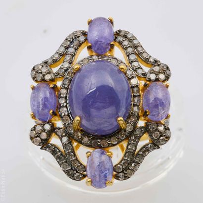 BAGUE TANZANITES DIAMANTS 
Bague en argent...