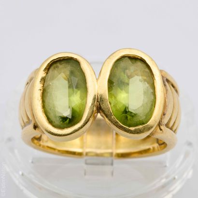 BAGUE
Bague en or jaune 18K (750 millièmes)...