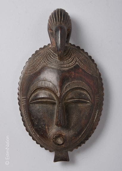 ARTS D'AFRIQUE
Masque en bois sculpté de...