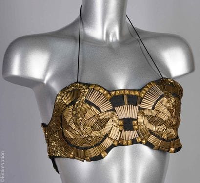 ANONYME VINTAGE
BRASSIERE en tissu noir recouverte...
