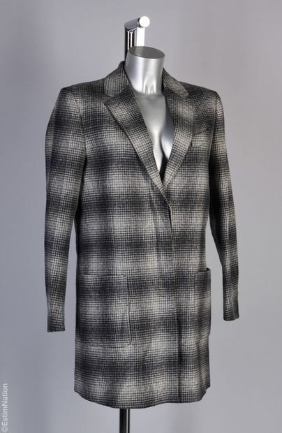 MAURO GRIFONI
Coat in wool with a predominantly...