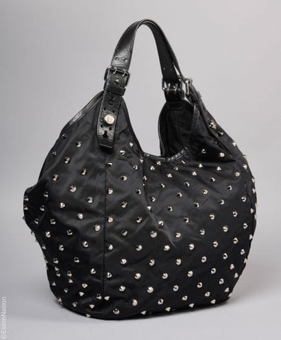 GIVENCHY
CABAS in black nylon, leather handles,...