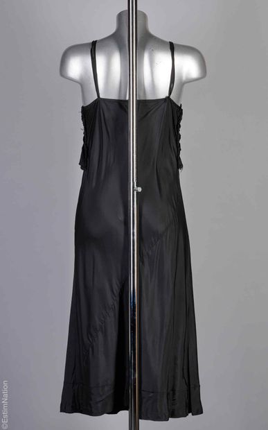 COMME DES GARÇONS (GRIFFE DECOUPÉE)
ROBE...