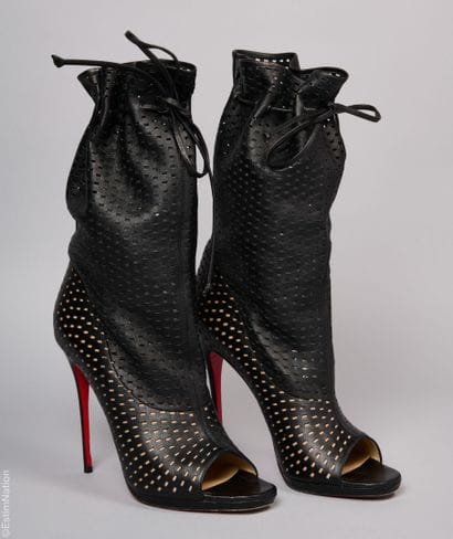 CHRISTIAN LOUBOUTIN
PAIR OF OPEN-TOE BOOTS...