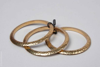 ANONYMOUS
SET OF THREE BRACELETS in patinated...