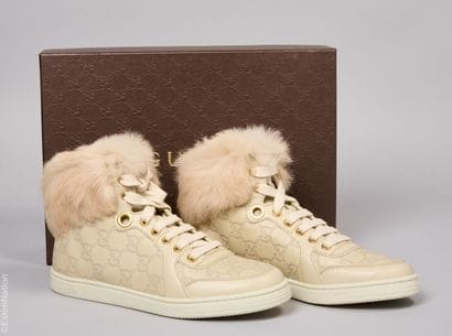 GUCCI (2012)
Pair of beige GG embossed leather...