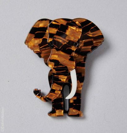 ANONYMOUS 
Polychrome acrylic pin depicting...