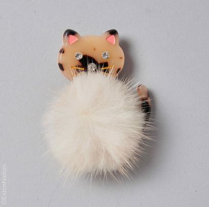 ANONYMOUS 
Polychrome acrylic brooch depicting...