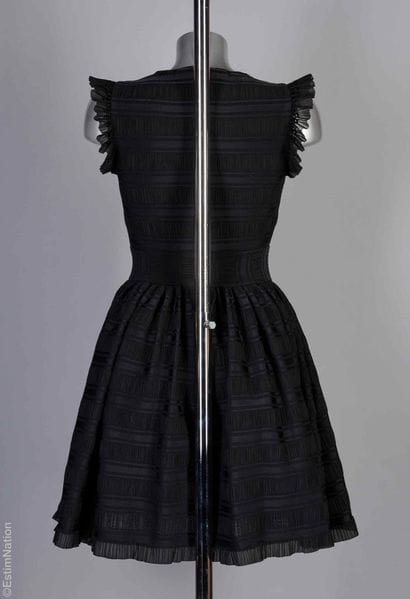 MAJE
COCKTAIL DRESS in black pleated polyester...