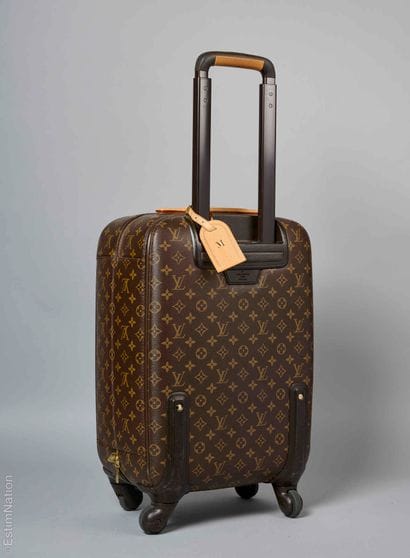 LOUIS VUITTON (2013)
VALISE à roulettes 