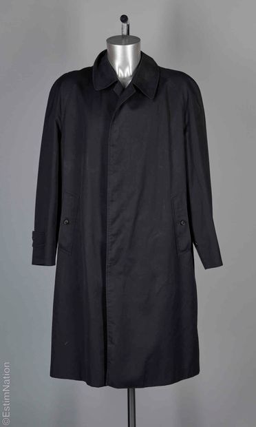 BURBERRYS'
PARDESSUS in polyester and black...