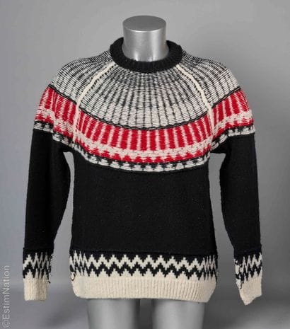 BURBERRY
EPAIS PULL OVER en tricot de laine...