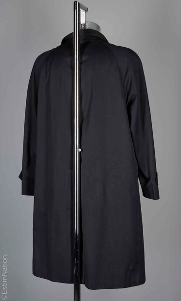 BURBERRYS'
PARDESSUS in polyester and black...