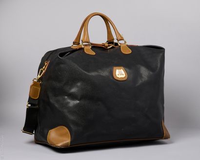 LANCEL VINTAGE
SAC DE VOYAGE en toile enduite...