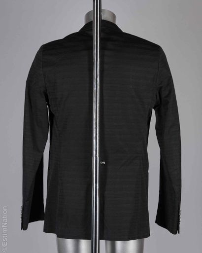 LOUIS VUITTON
VESTE en coton et lin façonné...