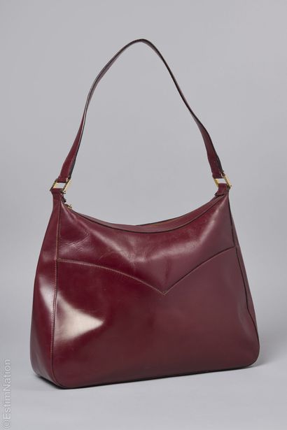 YVES SAINT LAURENT CIRCA 1990
Burgundy leather...