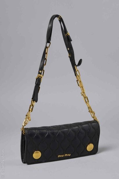 MIU MIU
SAC portefeuille compagnon en agneau...