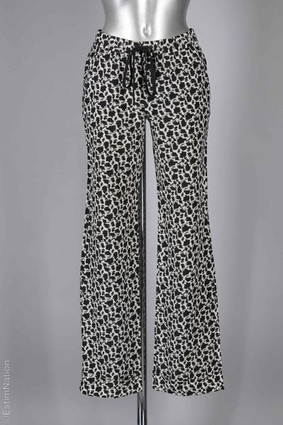 SANDRO, JOSEPH
Black pleated polyester SKIRT...