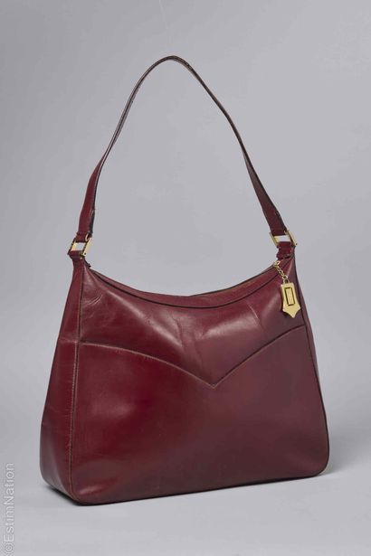 YVES SAINT LAURENT CIRCA 1990
Burgundy leather...