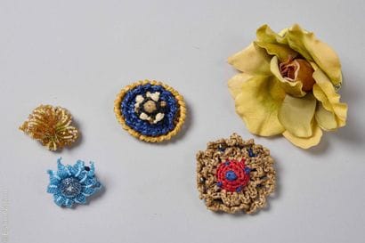 PRADA, CHERRY CHAU, ANONYMOUS
TWO BROOCHES...