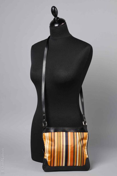 DOLCE & GABBANA
Black calfskin bag with orange-dominated...