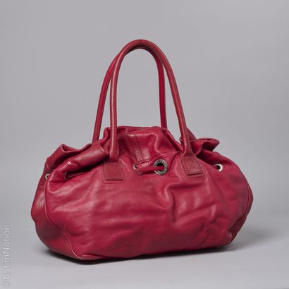 SONIA RYKIEL
Raspberry-colored grained leather...