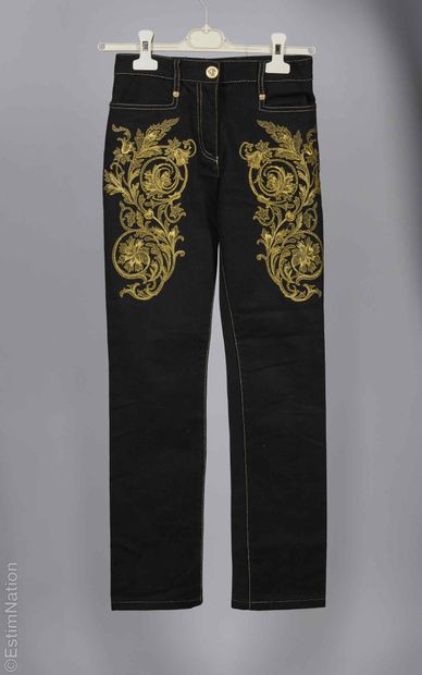 VERSACE
TWO JEANS in stretch denim: the first...