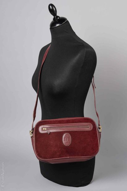 CARTIER VINTAGE
SAC en cuir et peau bordeaux...