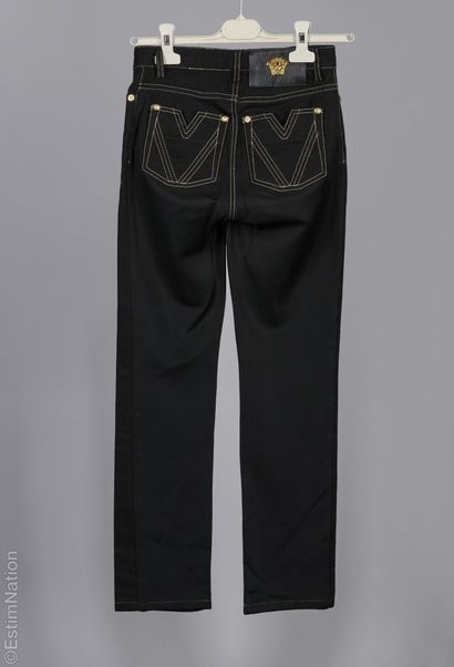 VERSACE
TWO JEANS in stretch denim: the first...
