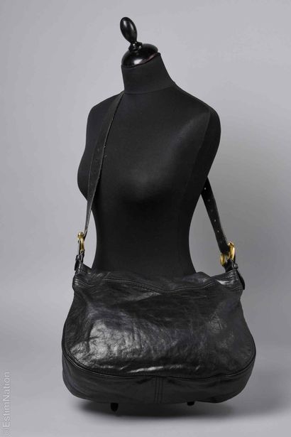 ALEXANDER MCQUEEN
Black distressed leather...