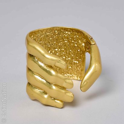 ANONYMOUS
Surrealist-inspired metal cuff...