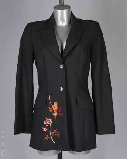 KENZO JUNGLE
Black wool jacket with tennis...