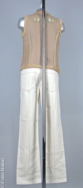 MAJE, ISABEL MARANT
Beige sheep shearling...