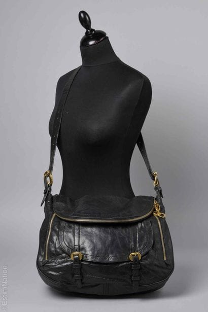 ALEXANDER MCQUEEN
Black distressed leather...