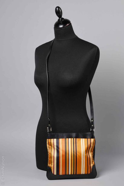 DOLCE & GABBANA
Black calfskin bag with orange-dominated...