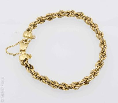 TWINED YELLOW AND WHITE GOLD BRACELET
18K...