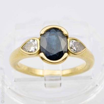 YELLOW GOLD SAPPHIRE AND DIAMOND RING
18K...