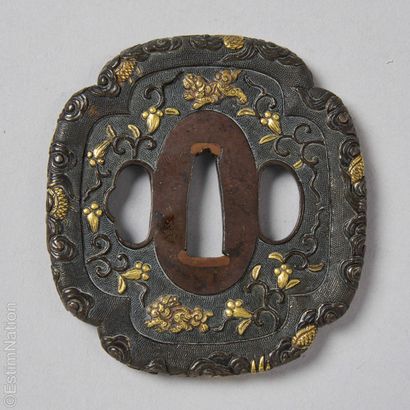 ASIAN ART
Mokko gata tsuba in yamagame with...