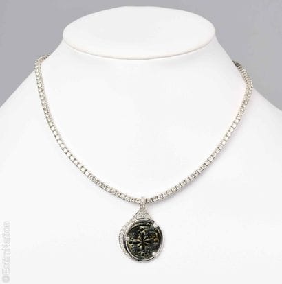 WHITE GOLD AND DIAMOND NECKLACE
An 18K white...