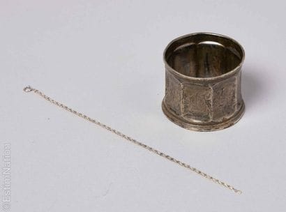 SILVERWARE 
950-thousandths silver napkin...